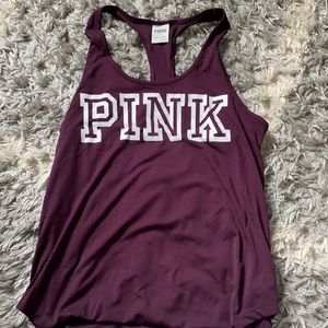 Small, pink razor back tank.